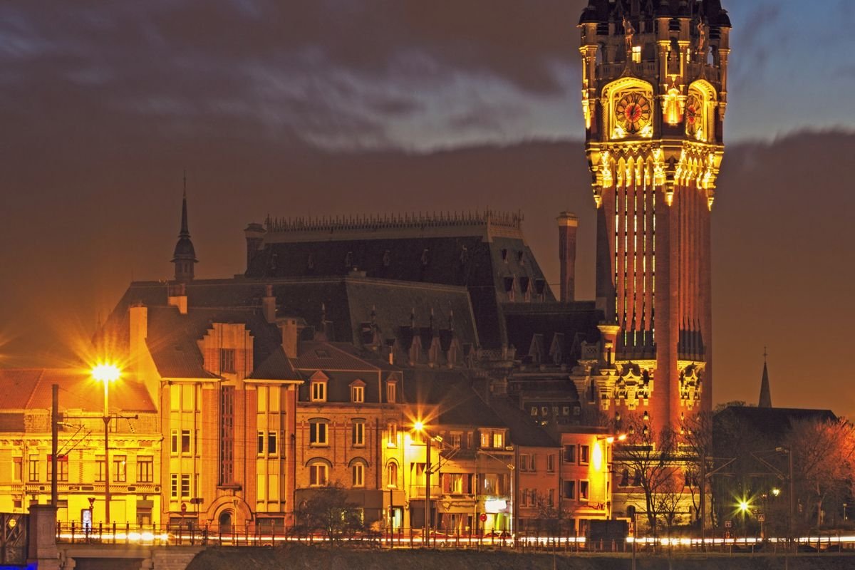 Calais Town Hall and belfry illuminated at night