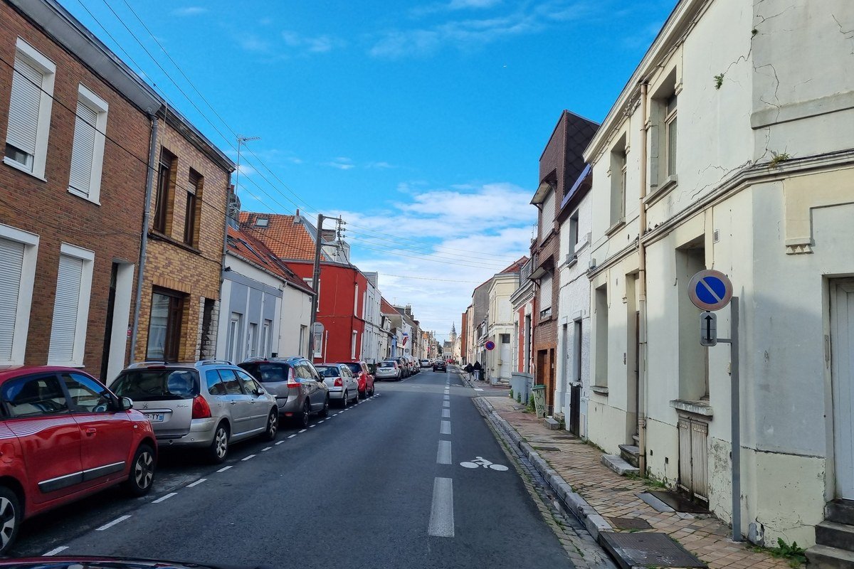 Street in central Calais looking towards the Town Hall belfry