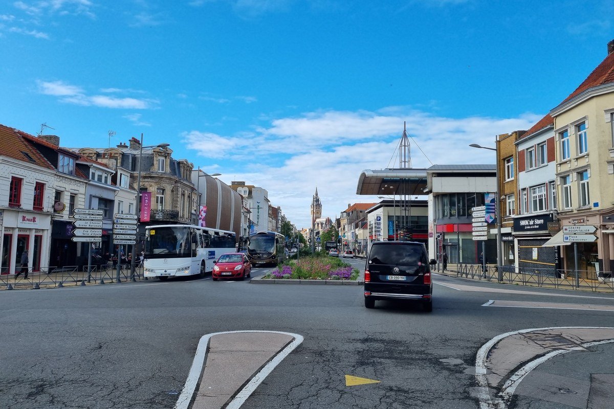 Roundabout in central Calais with the Town Hall belfry behind it